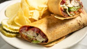 Cables Pub and Grill Greeley, Colorado restaurant and bar deli wrap with potato chips