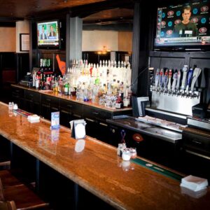 Cables Pub and Grill Greeley, Colorado restaurant and bar beer tap handles and alcohol bottles for cocktails